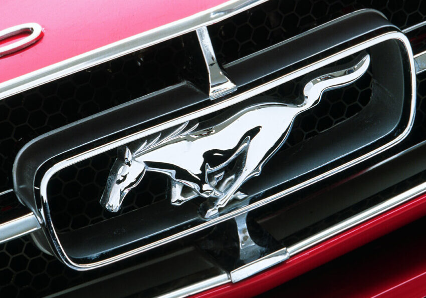 Mustang Logo Badge on Red Car
